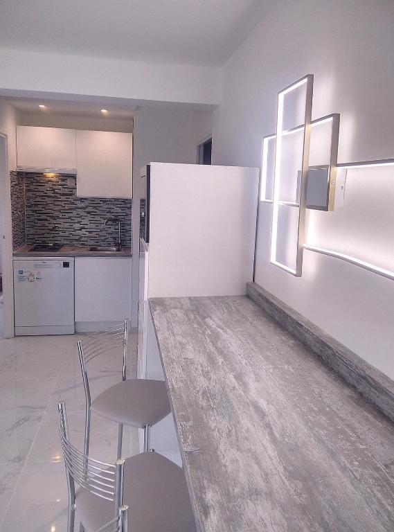 Kuchyňa alebo kuchynka v ubytovaní Résidence Graziella Appartement 521