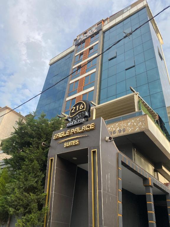 a building with a sign in front of it at 216 Eagle Palace Suite in Istanbul