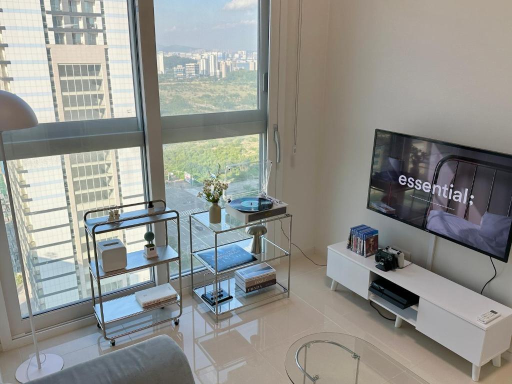TV a/nebo společenská místnost v ubytování Grape Residence Hotel