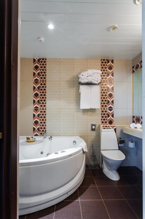 Vannituba majutusasutuses Hotel Rocca al Mare