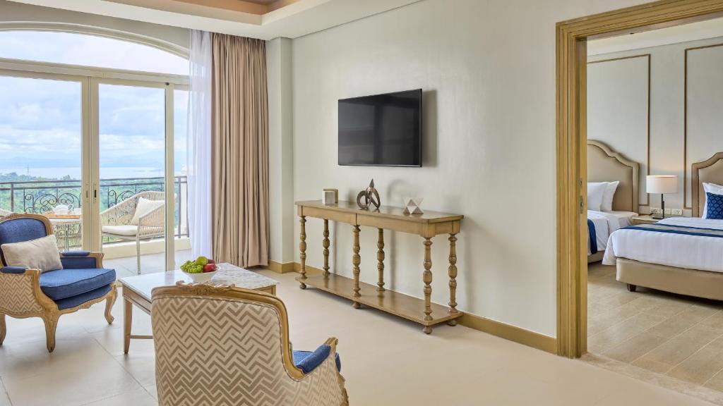 Postel nebo postele na pokoji v ubytování Twin Lakes Hotel near Tagaytay