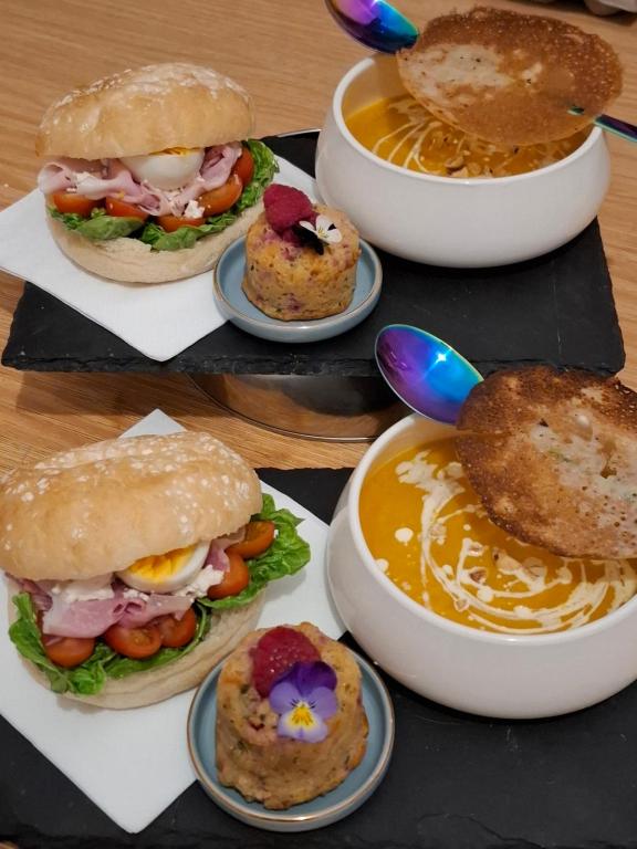 a group of sandwiches on plates on a table at Le Mas Victoria - Chambres d'hôtes avec table d'hôtes-Parking privé ferme in Carcassonne