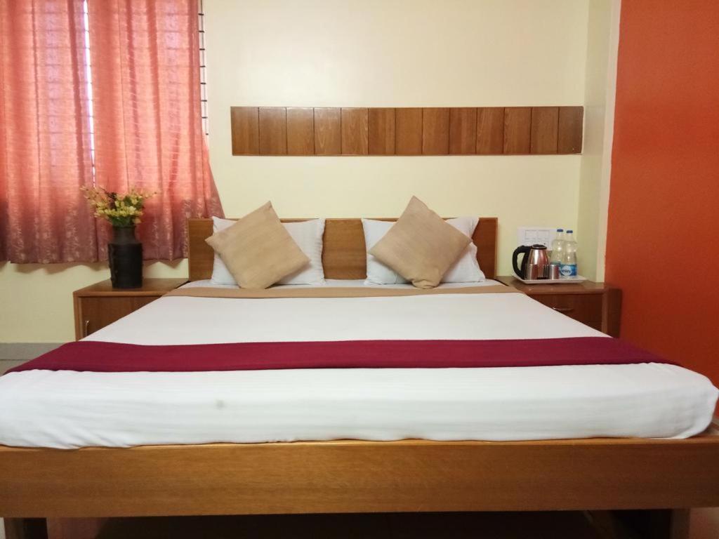 Katil atau katil-katil dalam bilik di Jasmine Suites
