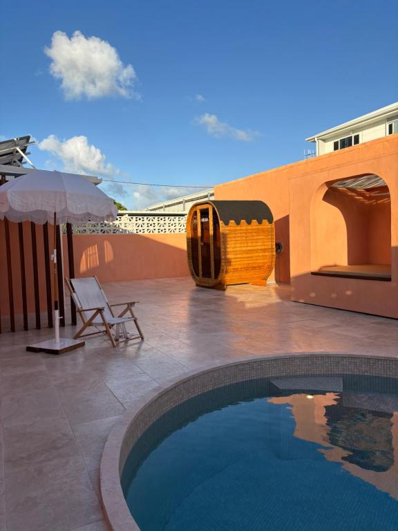 a swimming pool on the roof of a building at Pacific Sun Bargara in Bargara