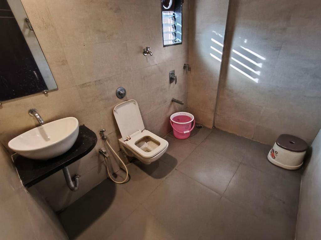 Ett badrum på Hotel Vijay Sagar Dombivali
