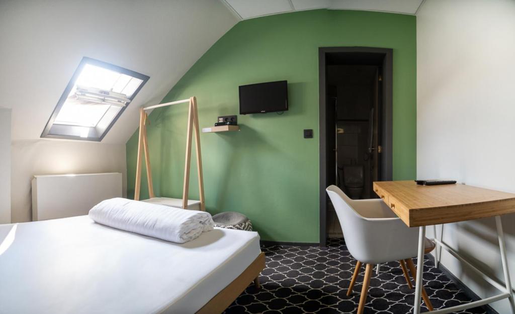 Postel nebo postele na pokoji v ubytování Safestay Brussels Grand Place