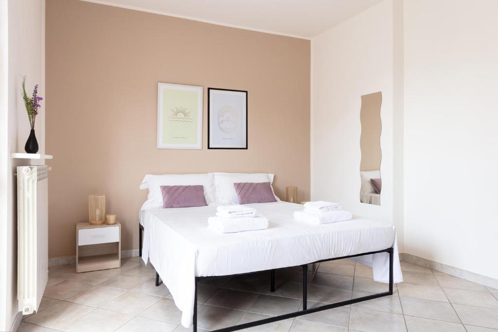 Postel nebo postele na pokoji v ubytování DeHomes - Relax & Business Apartments