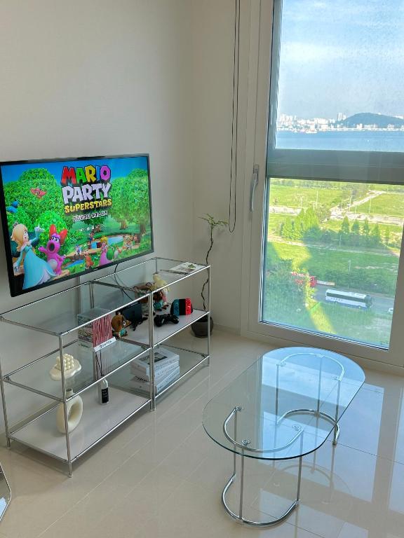 TV a/nebo společenská místnost v ubytování Grape Residence Hotel