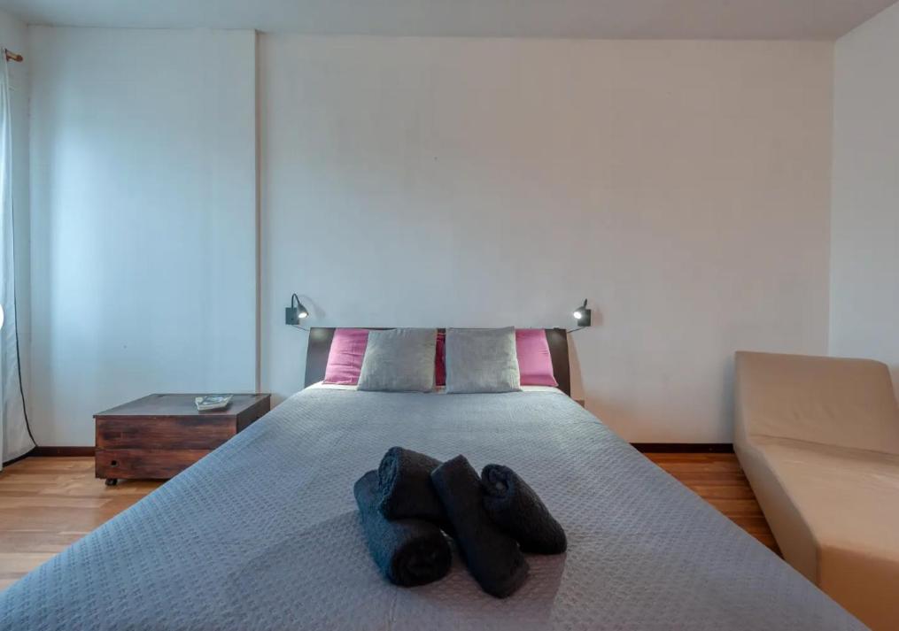 Postel nebo postele na pokoji v ubytování Salesiani rooms