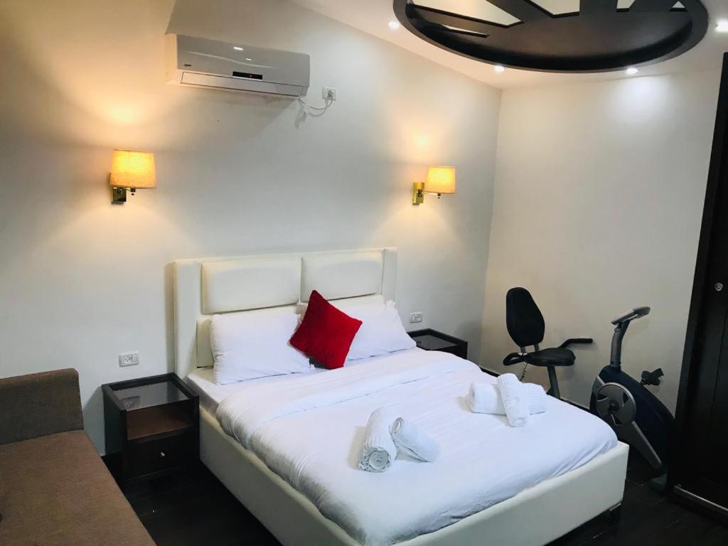 Postel nebo postele na pokoji v ubytování Assaraya Palace Hotel