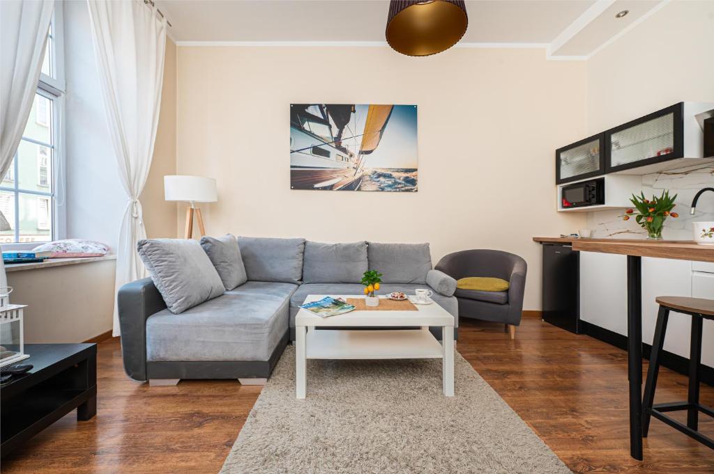 Posedenie v ubytovaní Długa Comfort Apartments