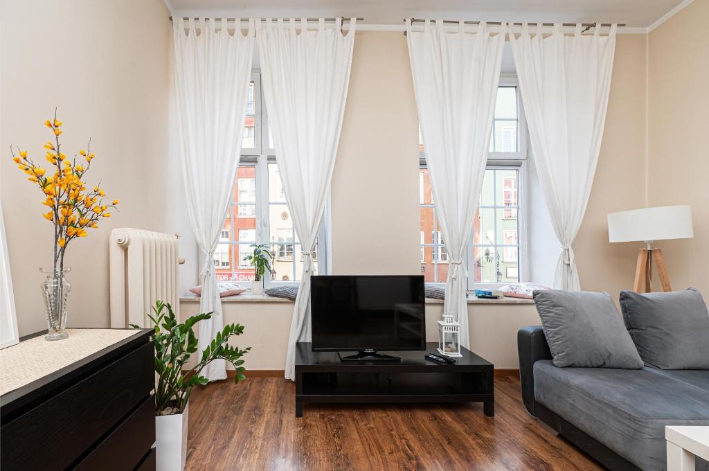 Posedenie v ubytovaní Długa Comfort Apartments