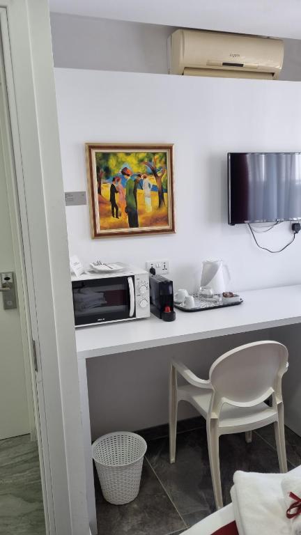 Kuchyň nebo kuchyňský kout v ubytování Art & Wine Boutique Hotel