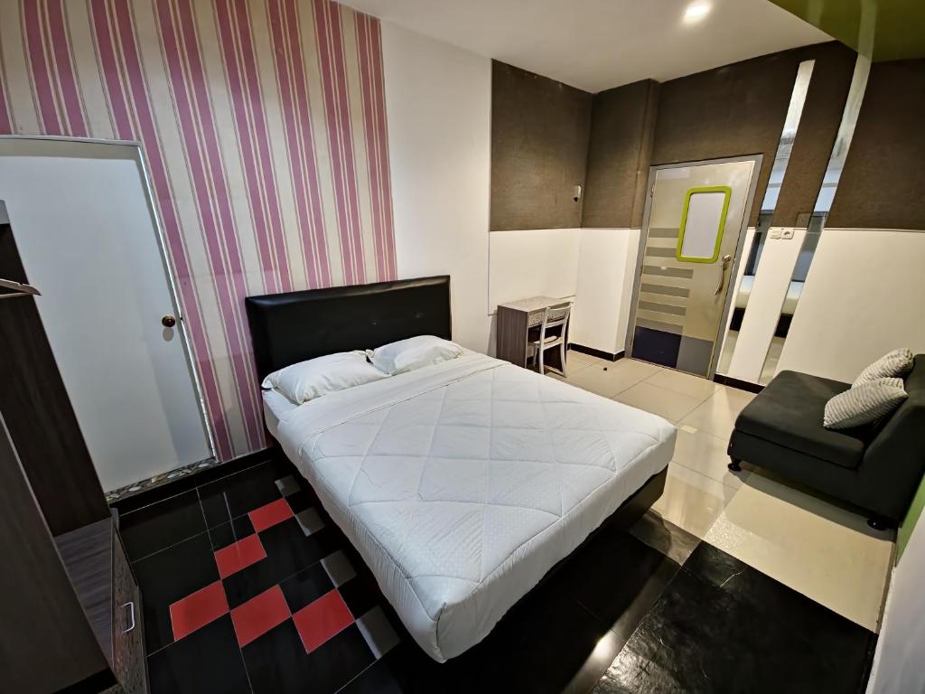 Postel nebo postele na pokoji v ubytování Orens Inn