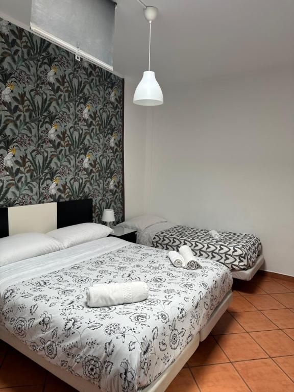 Postel nebo postele na pokoji v ubytování Happy House