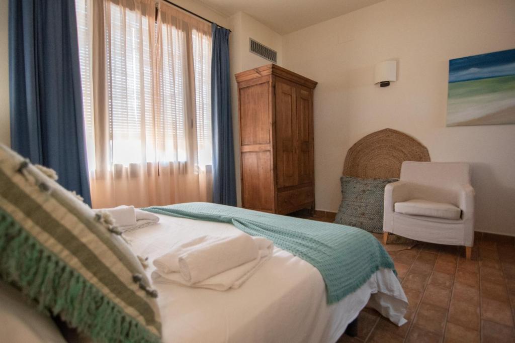 Postel nebo postele na pokoji v ubytování Masia Tinet