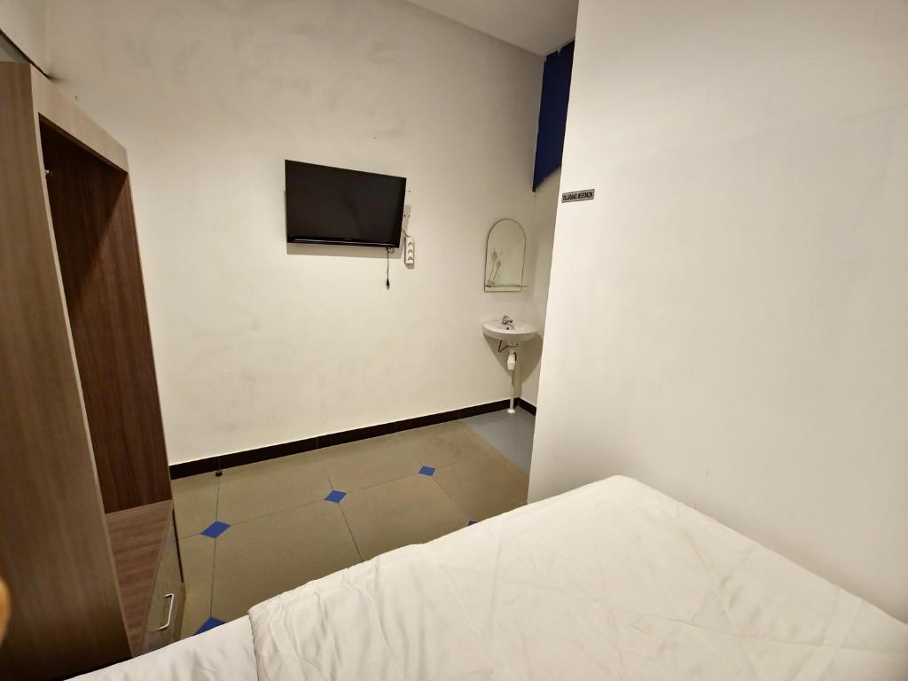 Postel nebo postele na pokoji v ubytování Orens Inn