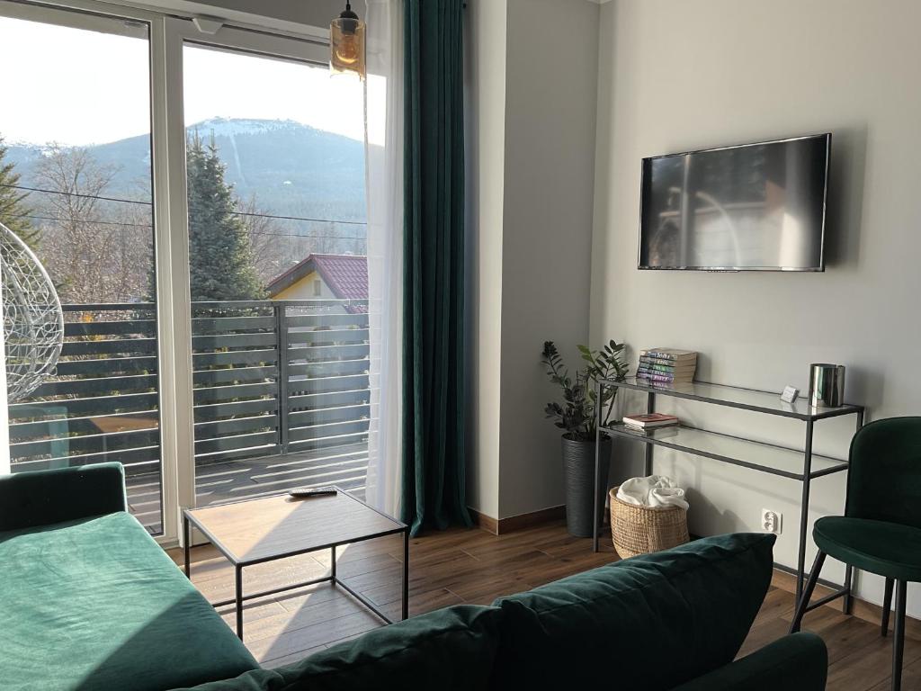 Nespecifikovaný výhled na hory nebo výhled na hory při pohledu z apartmánu