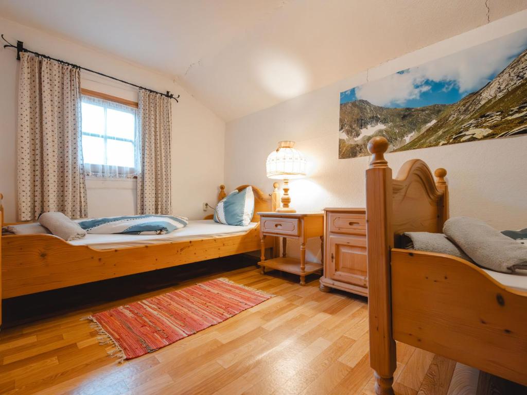 Postel nebo postele na pokoji v ubytování Holiday Home Alte Sahnealm by Interhome