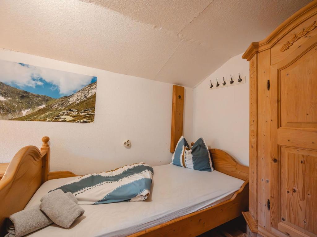 Postel nebo postele na pokoji v ubytování Holiday Home Alte Sahnealm by Interhome