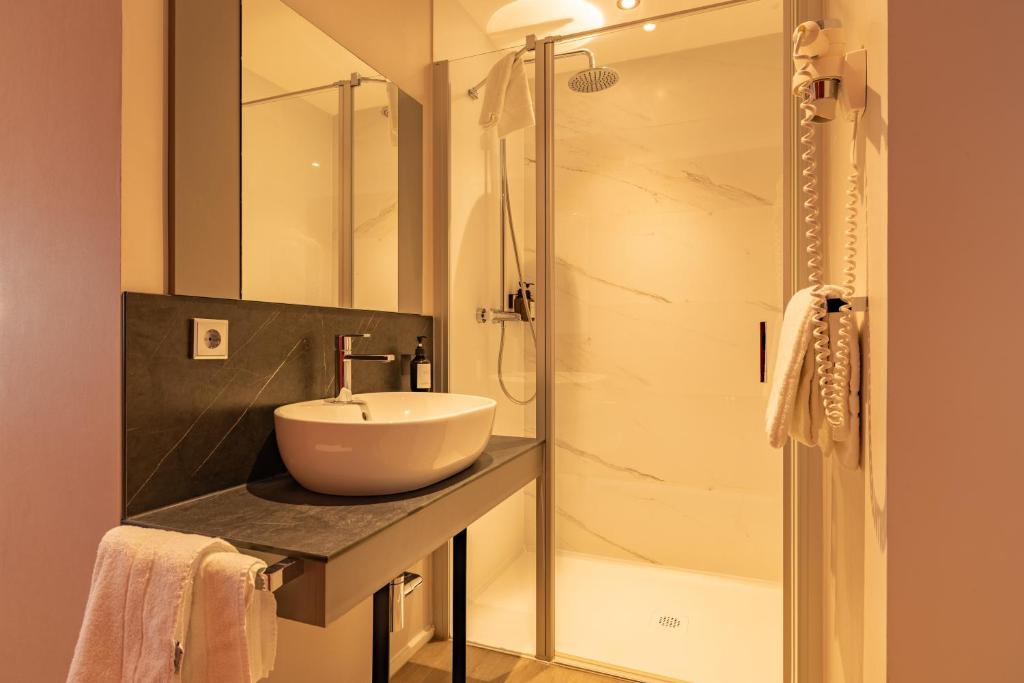Koupelna v ubytování MEA HOTEL TRIER