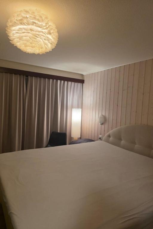 Postel nebo postele na pokoji v ubytování Apartment Cabane 8 by Interhome