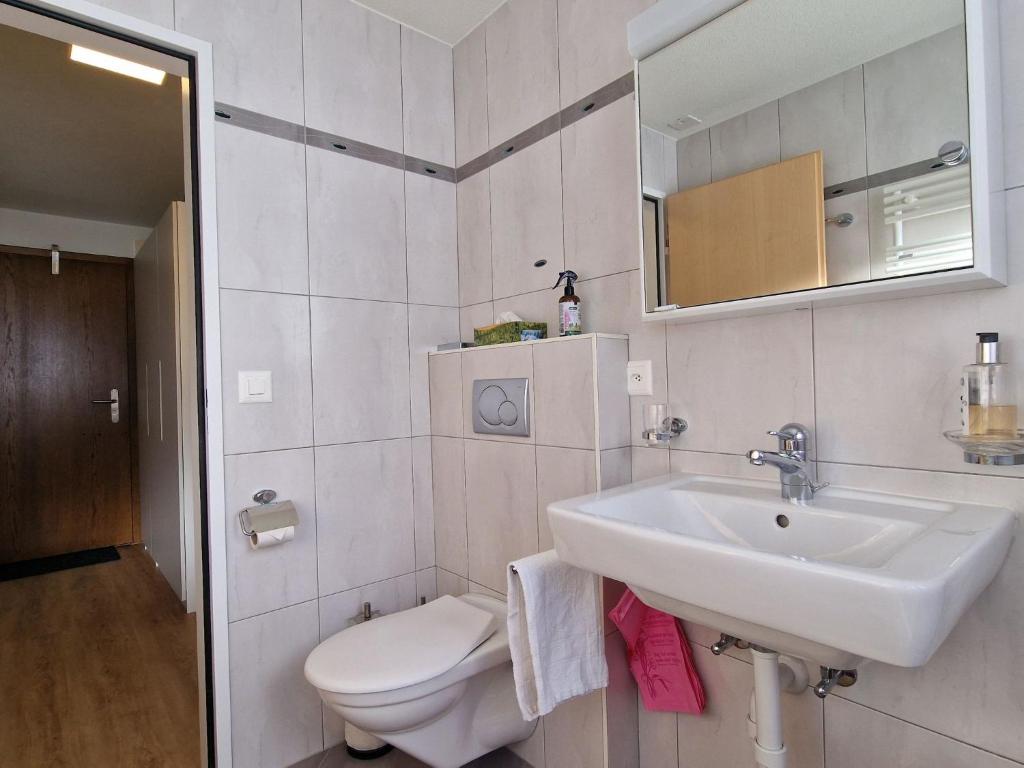 Koupelna v ubytování Apartment Cabane 8 by Interhome