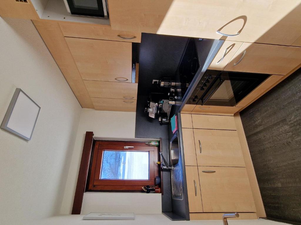 Kuchyň nebo kuchyňský kout v ubytování Apartment Cabane 8 by Interhome