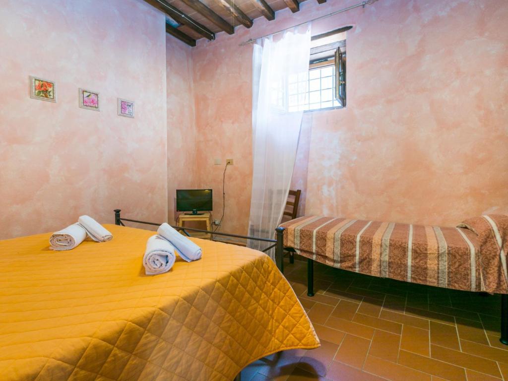 Postel nebo postele na pokoji v ubytování Apartment La Loggia by Interhome