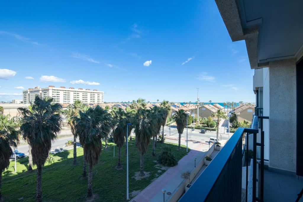 En balkon eller terrasse på Dorm4You Patacona