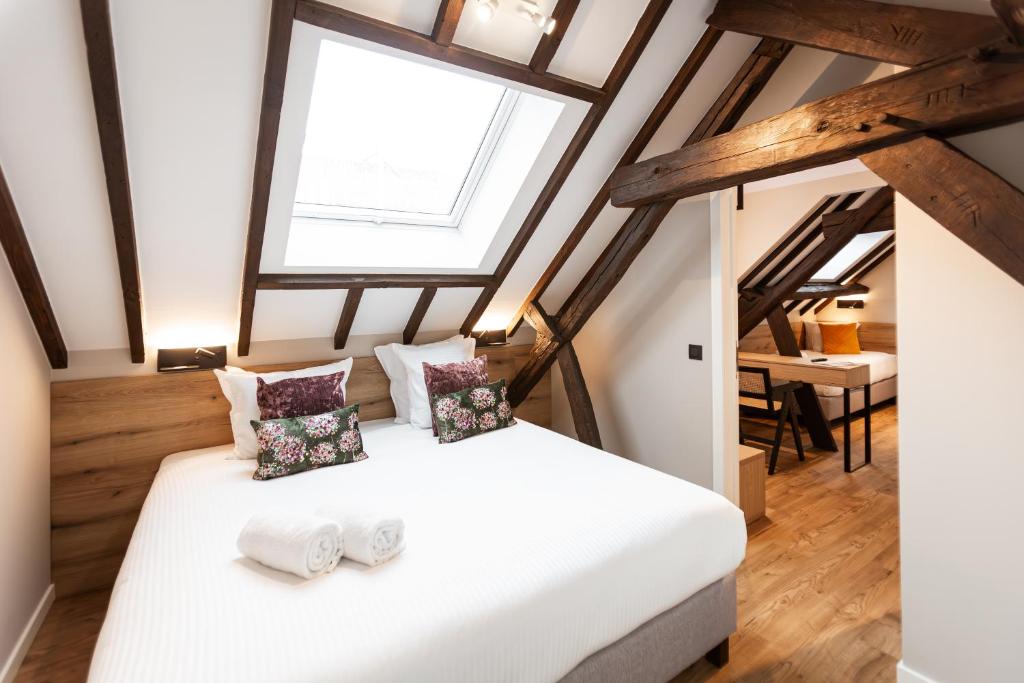 Postel nebo postele na pokoji v ubytování Hotel Onderbergen