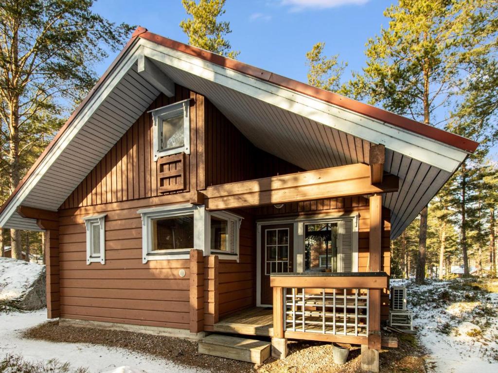 a tiny house in the woods at Holiday Home Selja 5 by Interhome in Isnäs