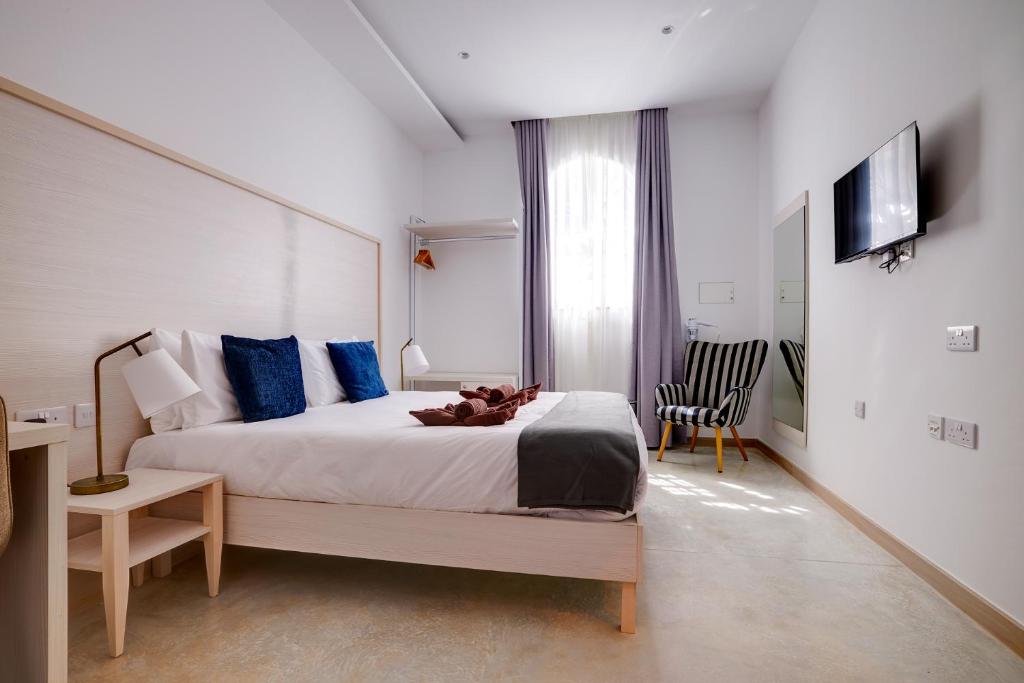 TV a/nebo společenská místnost v ubytování Kirxa Rooms and Suites