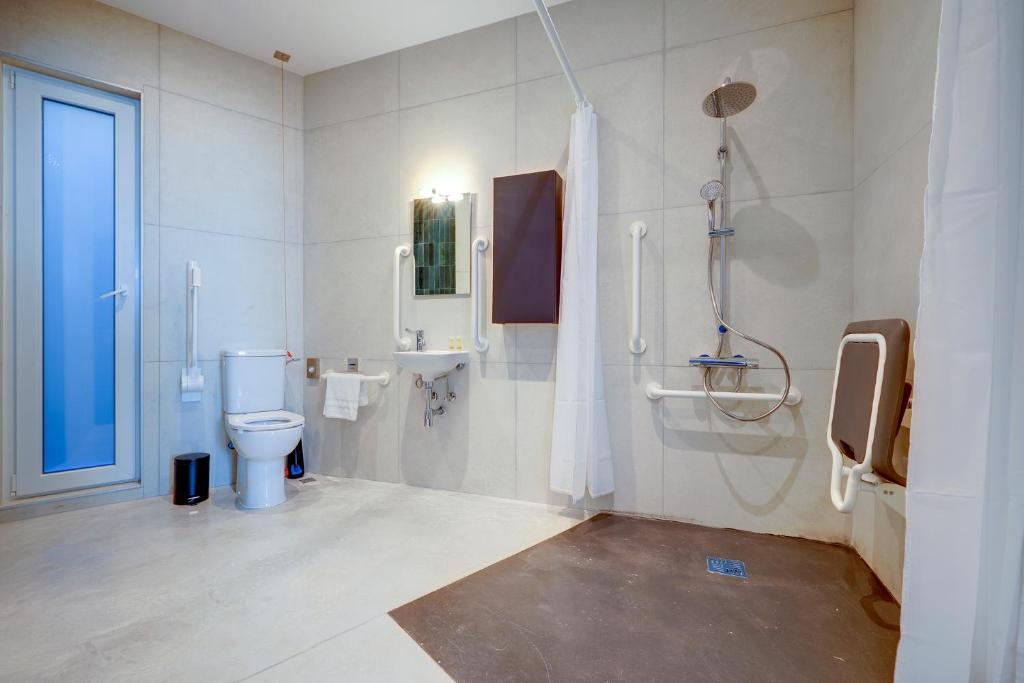 Koupelna v ubytování Kirxa Rooms and Suites