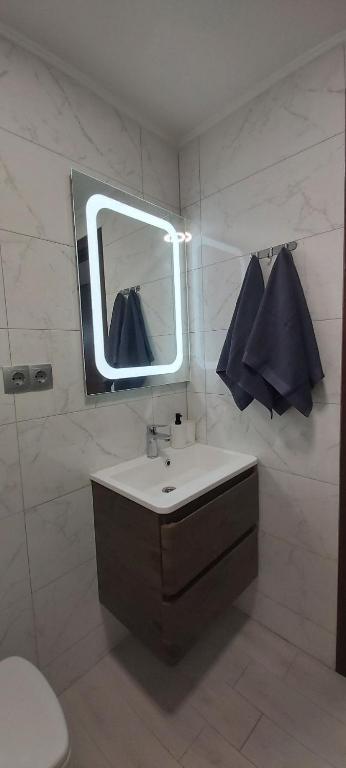 Koupelna v ubytování PETROVICH hotel
