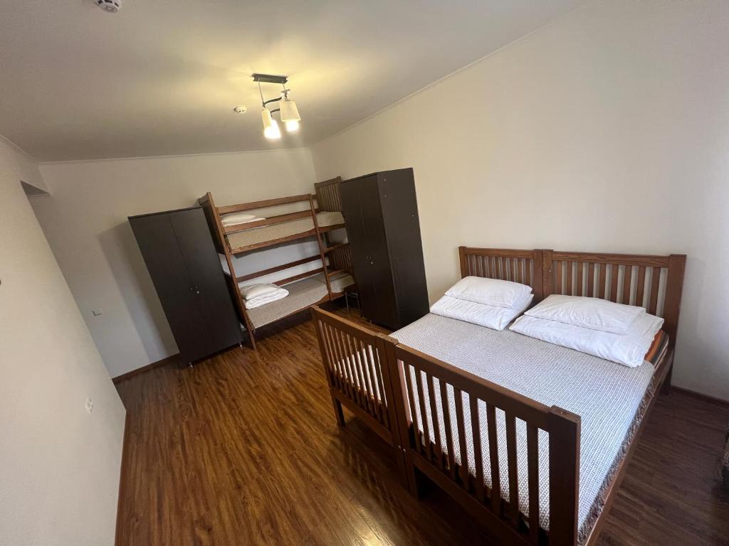 Postel nebo postele na pokoji v ubytování PETROVICH hotel