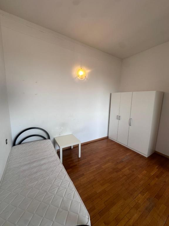 Postel nebo postele na pokoji v ubytování Piazza Vida 12 Palace