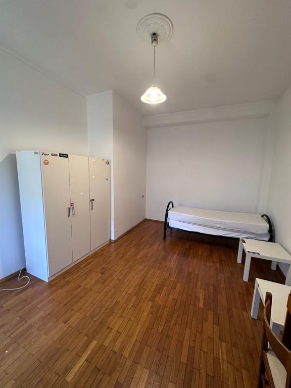 Postel nebo postele na pokoji v ubytování Piazza Vida 12 Palace