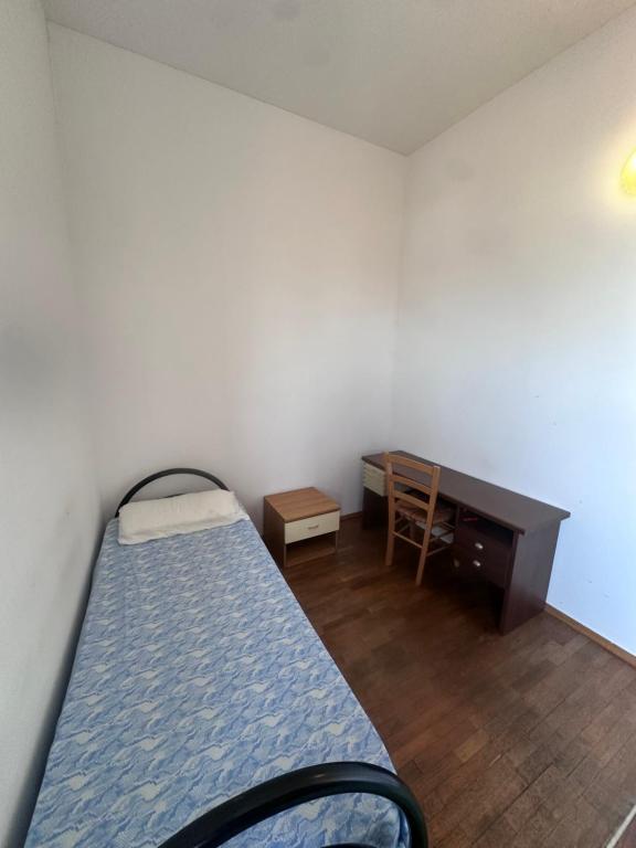 Postel nebo postele na pokoji v ubytování Piazza Vida 12 Palace