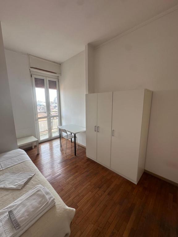 Postel nebo postele na pokoji v ubytování Piazza Vida 12 Palace