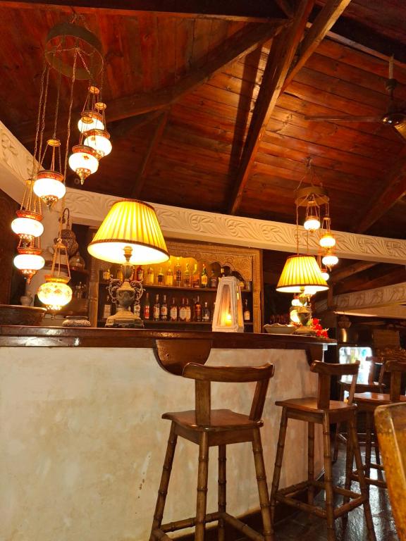Lounge nebo bar v ubytování African House Resort