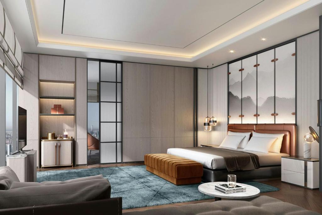 Postel nebo postele na pokoji v ubytování Sheraton Grand Xiamen Jimei