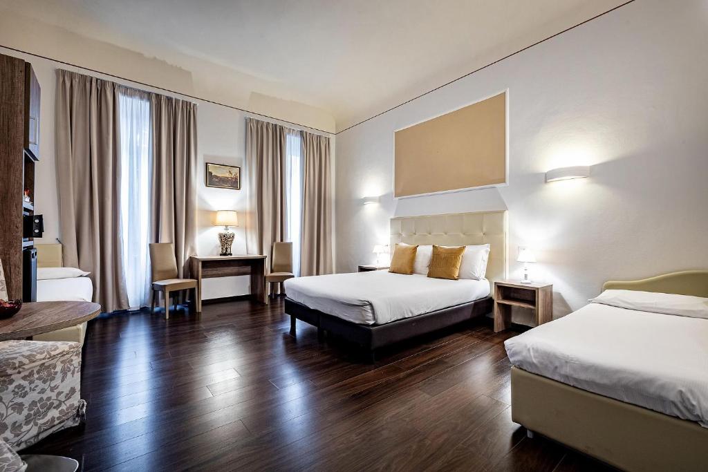 Postel nebo postele na pokoji v ubytování B&B De Biffi