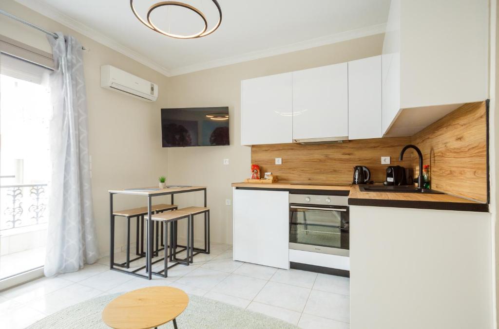 Kuchyň nebo kuchyňský kout v ubytování Angie VIP Suites