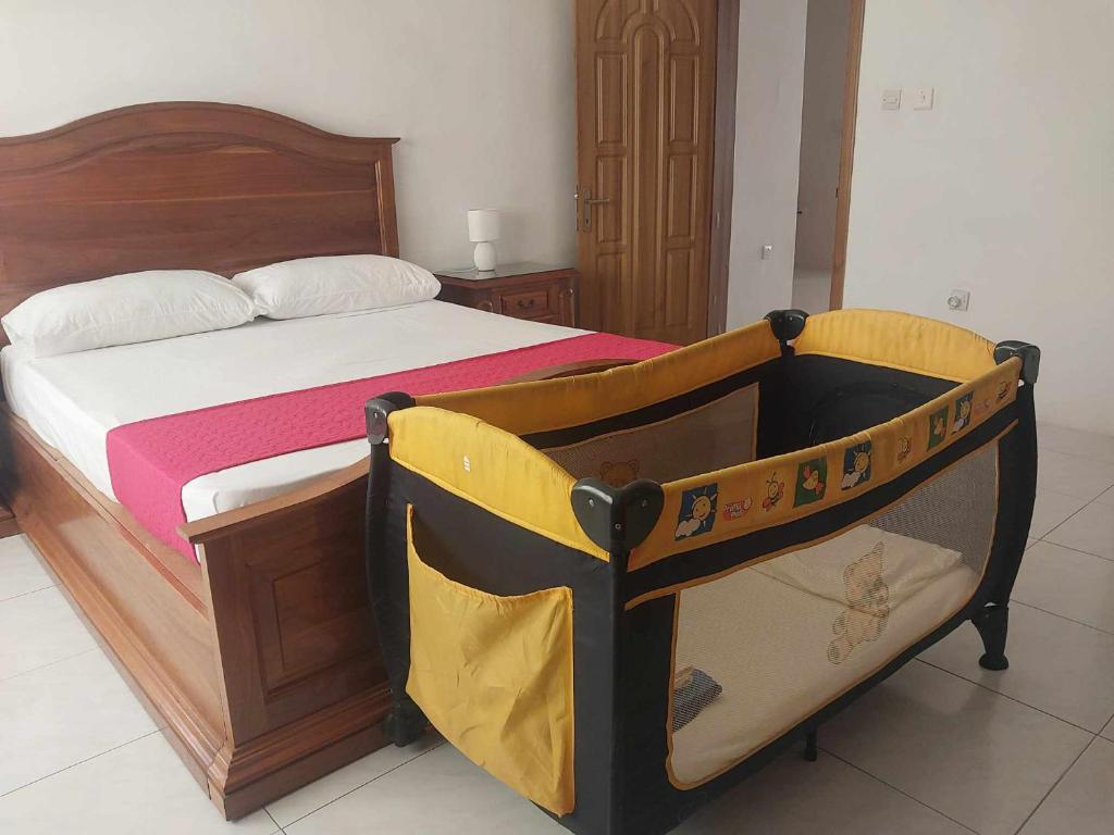 Postel nebo postele na pokoji v ubytování Nr41 Holiday Apartment - Close to Village Centre, Promenade, Shops & Restaurants
