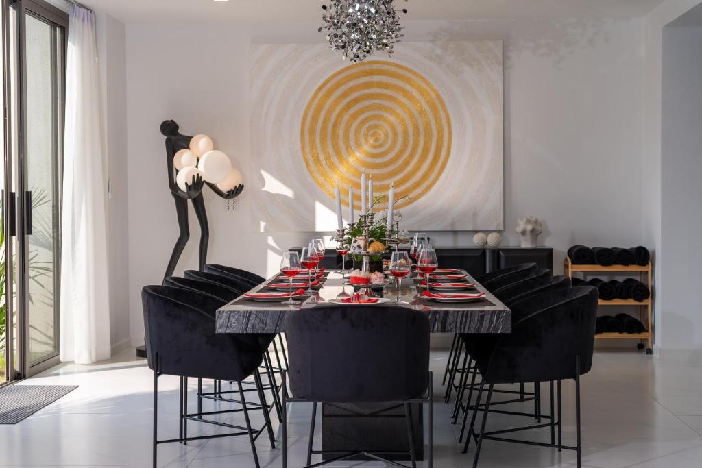 Posezení v ubytování Lumière Villas Phuket - Golfside Retreat in Laguna