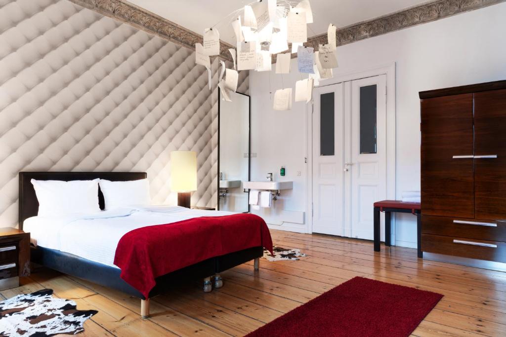 Postel nebo postele na pokoji v ubytování Hotel Adele am Alex
