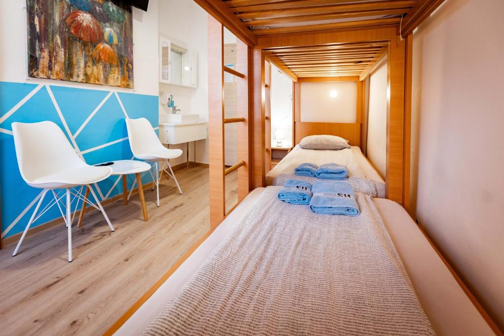 Postel nebo postele na pokoji v ubytování Hostel Soline