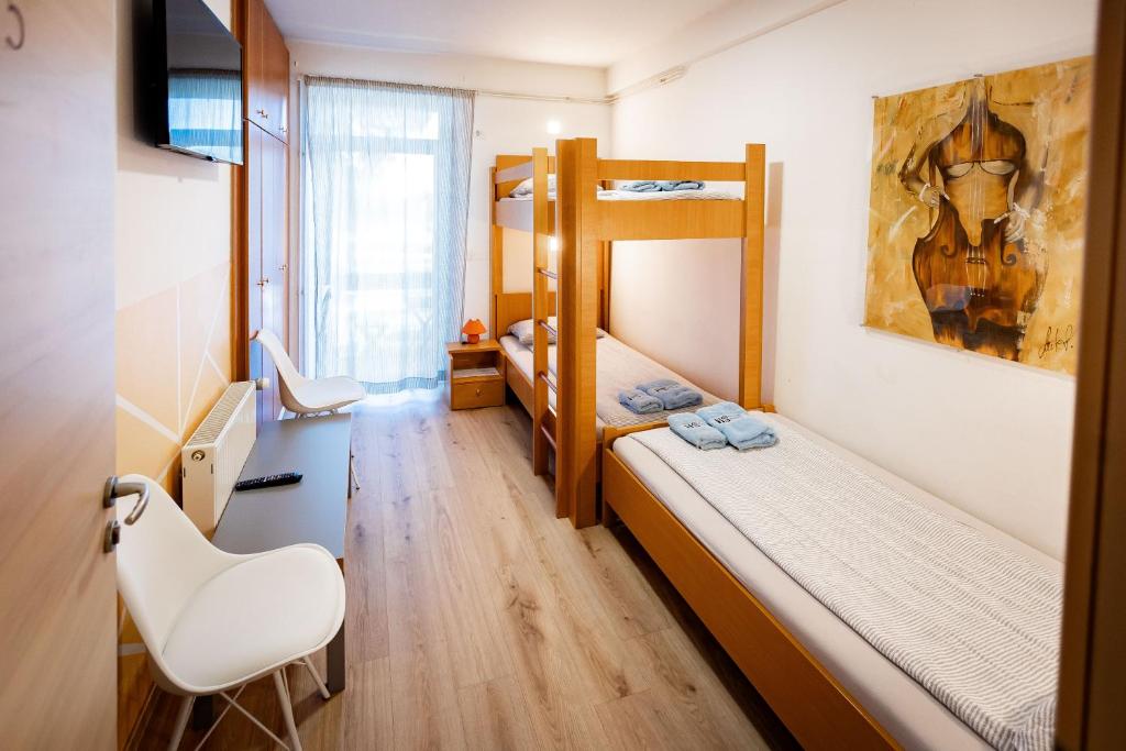 Postel nebo postele na pokoji v ubytování Hostel Soline