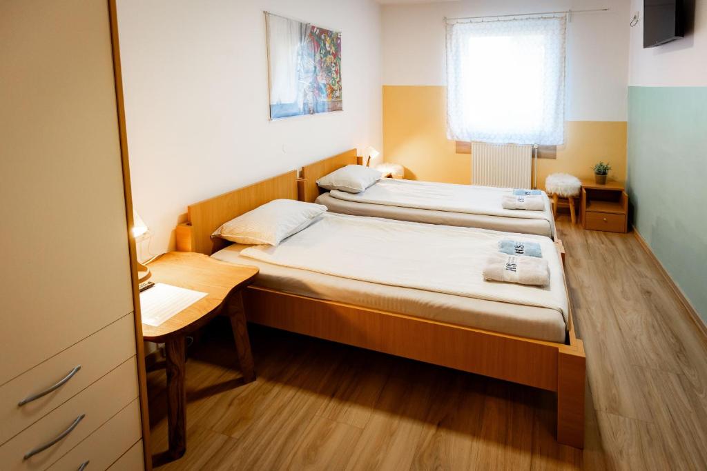 Postel nebo postele na pokoji v ubytování Hostel Soline